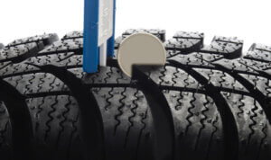 A measure of Tread Depth showing Signs tyre replacement time
